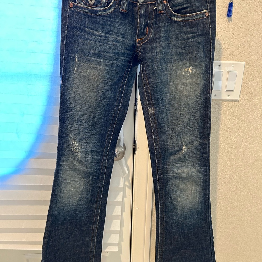 Distressed Denim Jeans